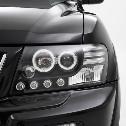 Mitsubishi Pajero NM / NP (2000 - 2006) Black High Power LED Angel Eyes Projector Headlights LH + RH installed