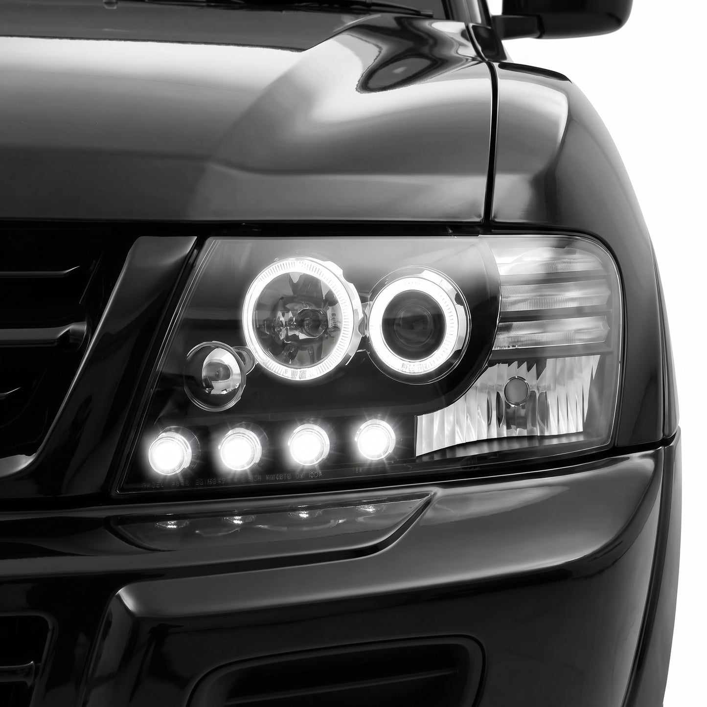Mitsubishi Pajero NM / NP (2000 - 2006) High power LED Angel Eyes Projector Headlights LH + RH