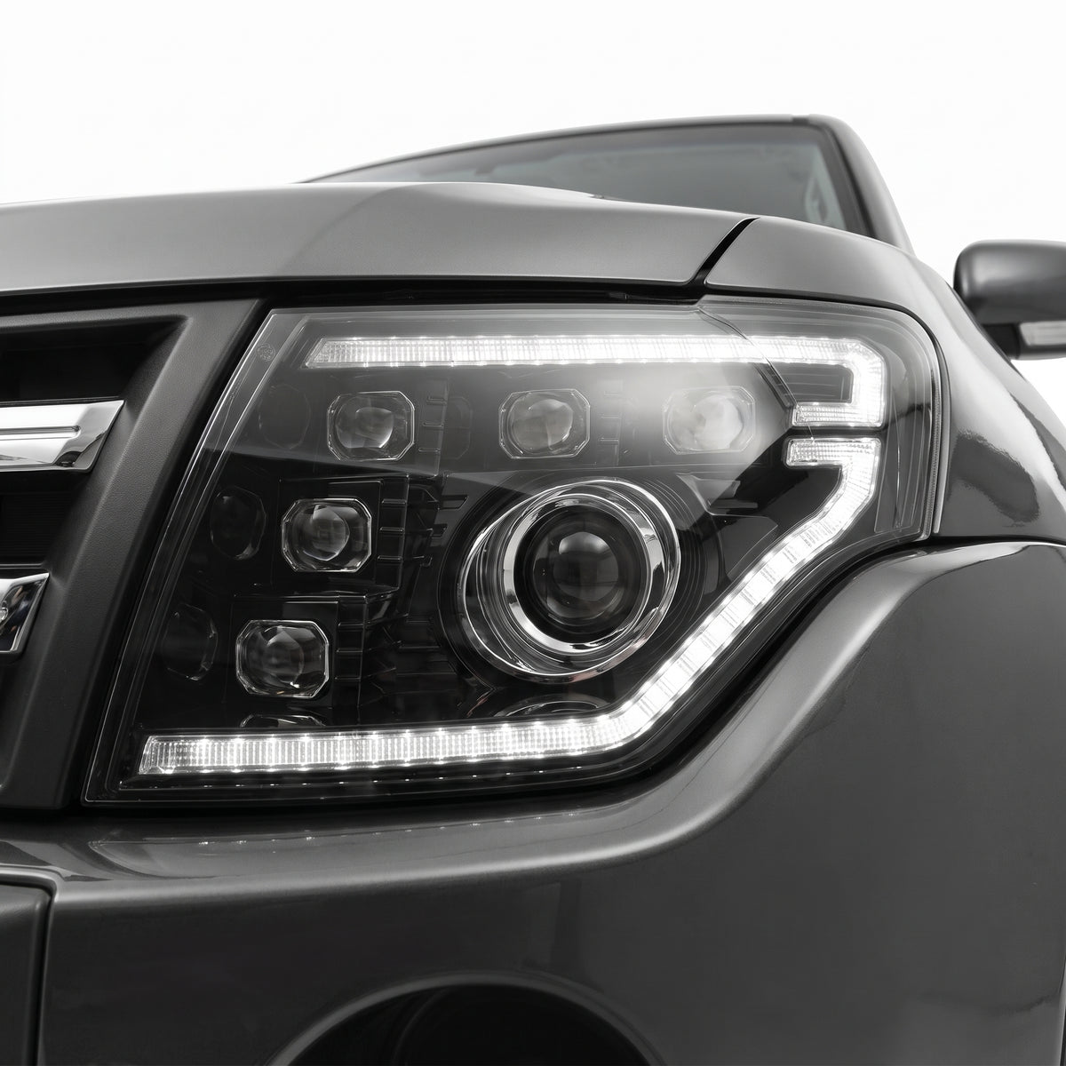 Mitsubishi Pajero NS / NT / NW / NX (2007 - 2021) DRL Style Full LED Projector Sequential Indicator Headlights LH + RH installed close-up