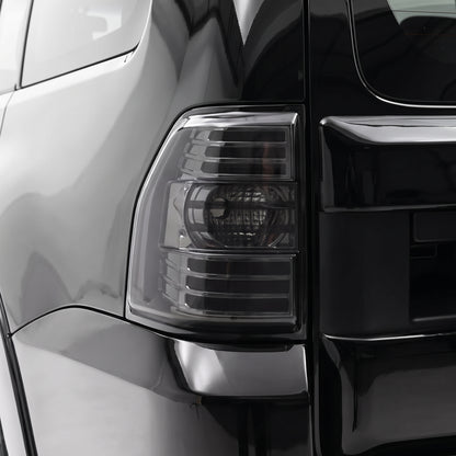 Mitsubishi Pajero NS / NT / NW (2007 - 2021) Full Smoked LED Stripe Bar Tail Lights LH + RH installed close-up