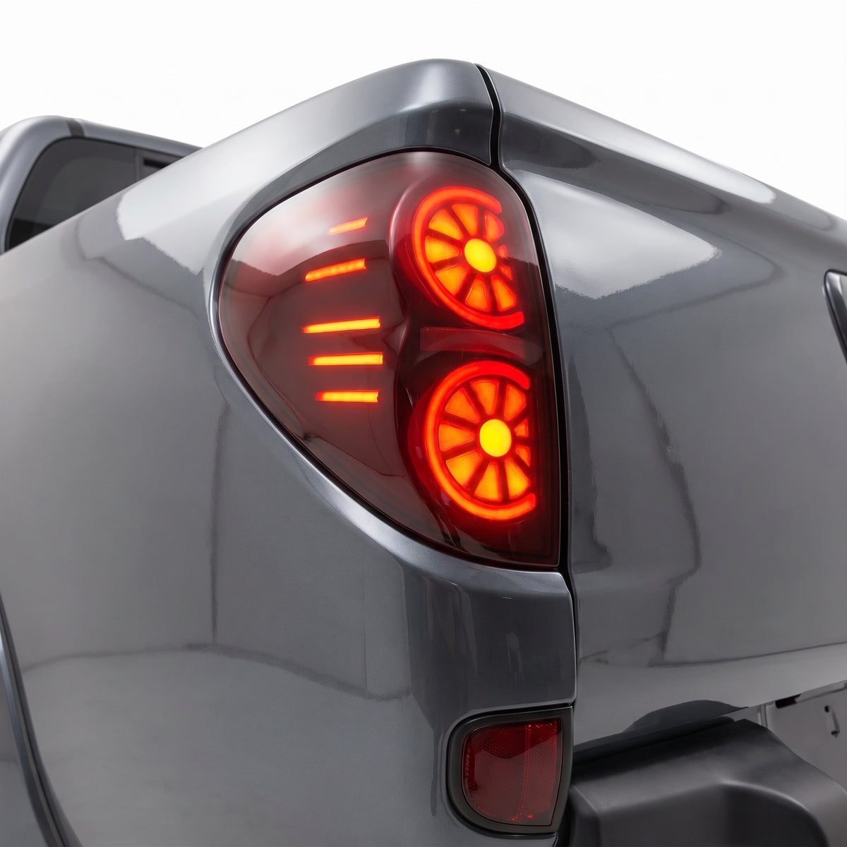 Mitsubishi Triton ML / MN (2006 - 2014) Smoked Black LED Tail Lights LH + RH installed close-up
