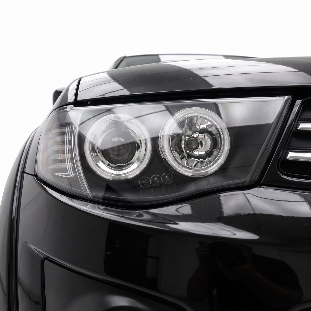 Mitsubishi Triton ML MN (2006 - 2015) BLACK Series Halo Angel Eyes Projector Headlights LH + RH installed close-up