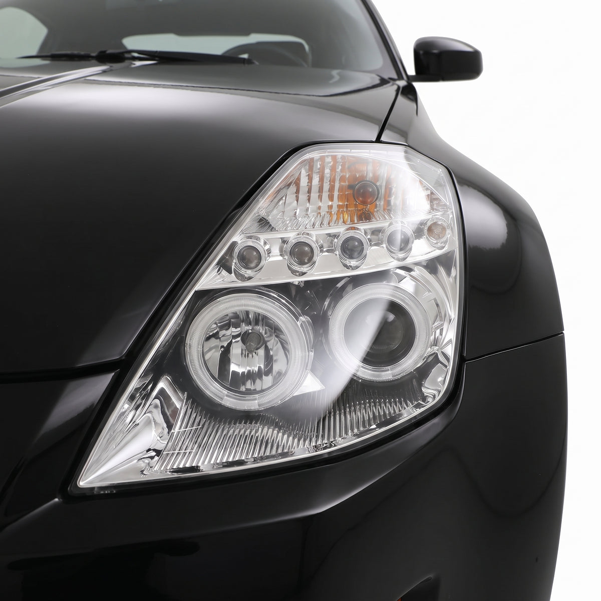 Nissan 350Z Z33 Series 1 (2003 - 2005) Crystal Clear Angel Eyes Projector Headlights LH + RH installed close-up