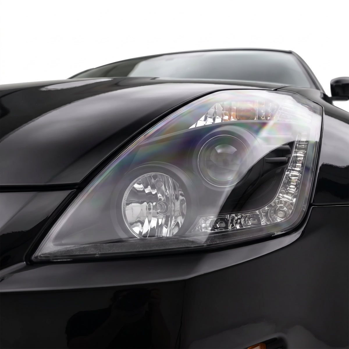 Nissan 350Z Z33 Series 2 (2006 - 2008) JDM Black LED DRL Projector Headlights LH + RH installed close-up