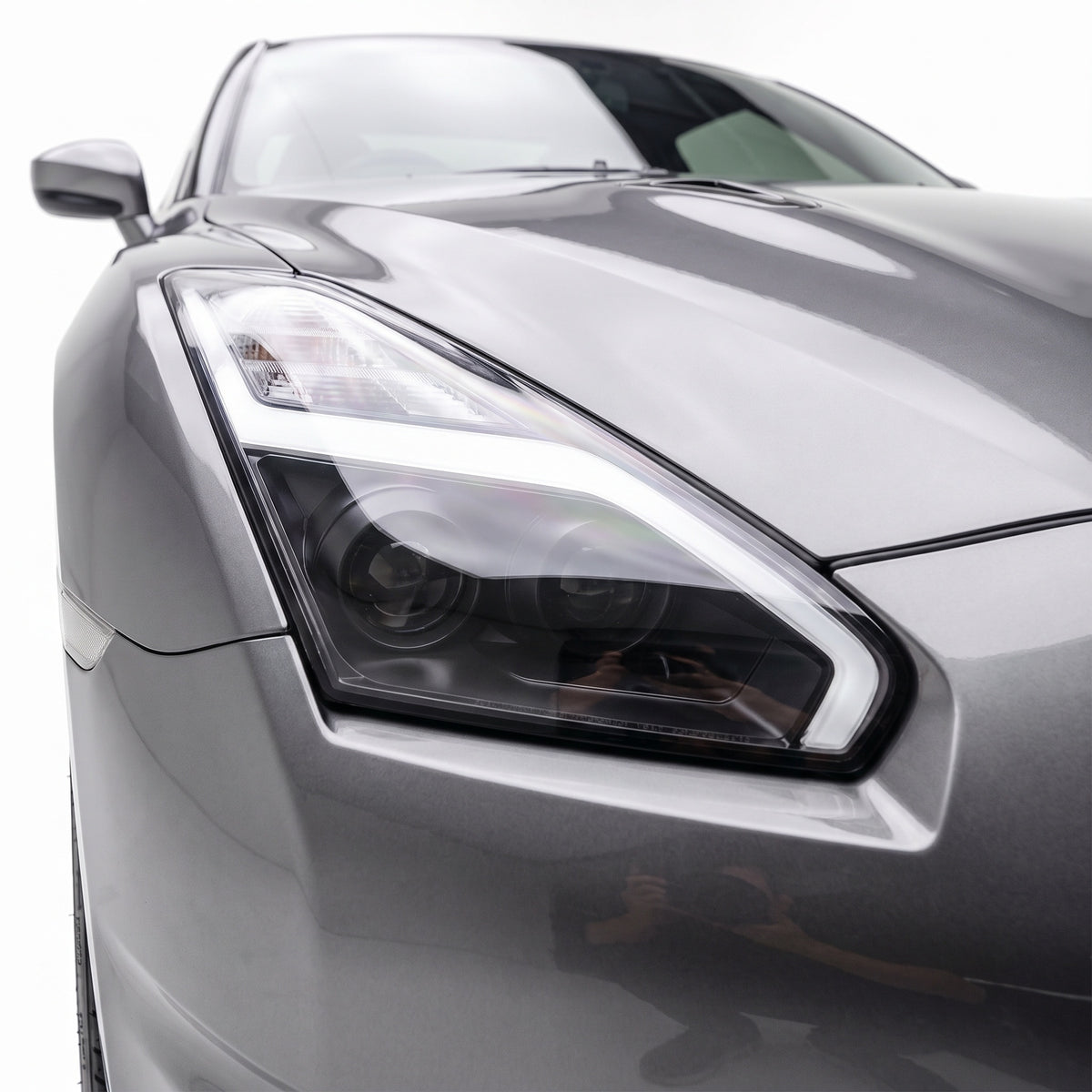 Nissan GT-R R35 (2007 - 2013) Crystal Eye Update Style DRL With LED Sequential Indicators Headlights LH + RH installed close-up