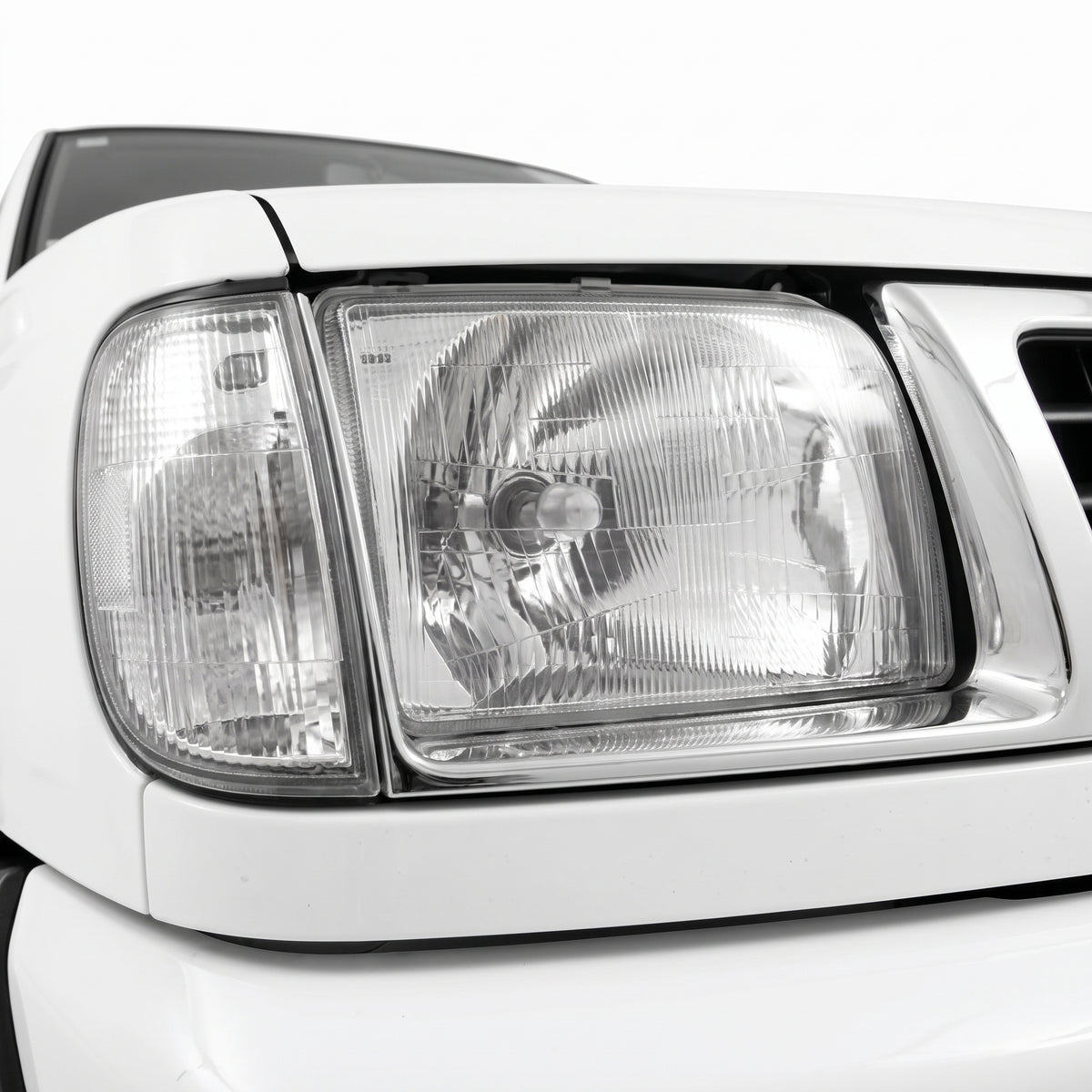 Nissan Navara D22 (1997 - 2000) OEM Style Headlights LH + RH installed close-up