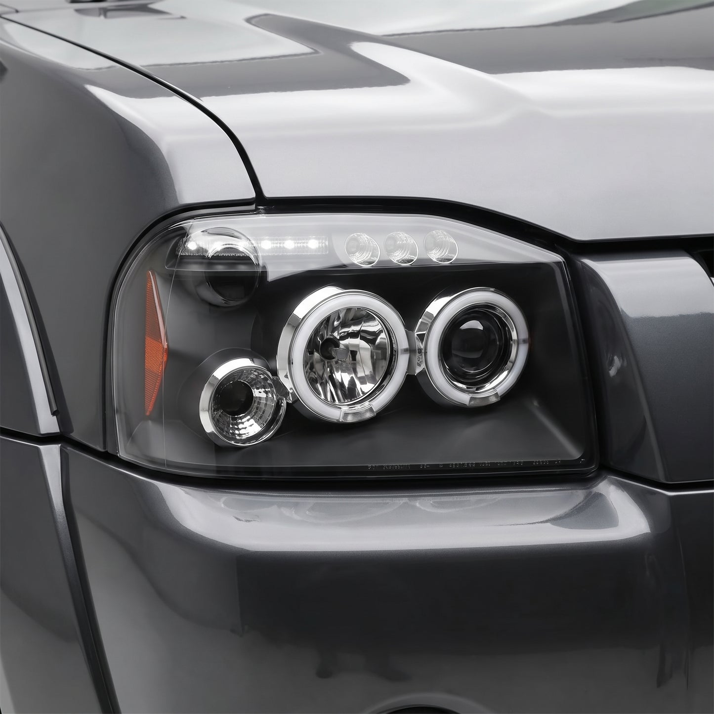 Nissan Navara D22 (2003 - 2014) Black Angel Eyes Projector Headlights LH + RH