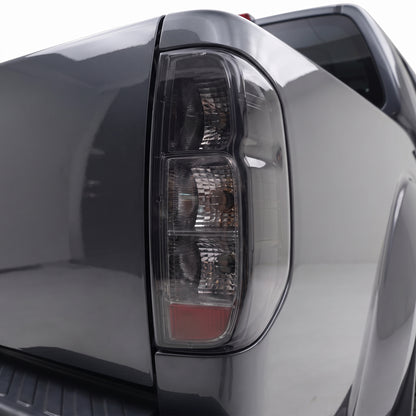 Nissan Navara D40 (2005 - 2013) Original Smoked Tail Lights LH + RH installed close-up