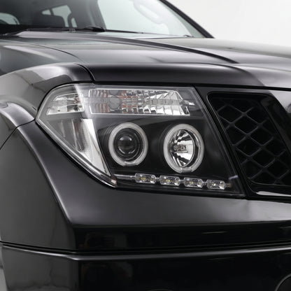 Nissan Navara D40 (2005 - 2014) Black CCFL Angel Eyes Projector Headlights LH + RH installed close-up