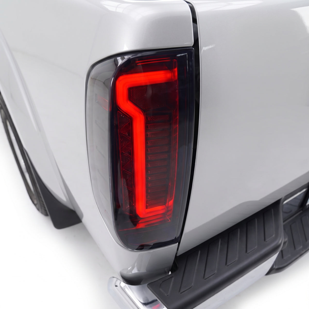Nissan Navara D40 (2005 - 2016) Smoked Tail Lights LH + RH installed close-up
