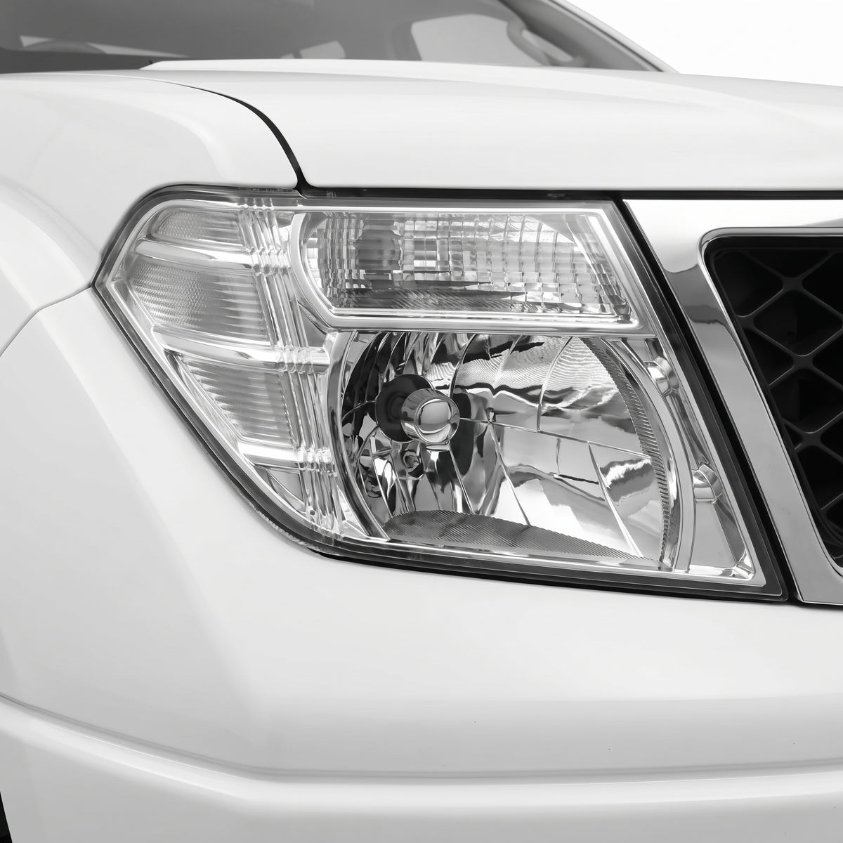 Nissan Navara D40 (2010 - 2015) OEM Headlights LH + RH installed close-up