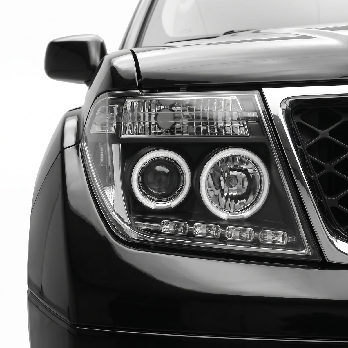 Nissan Pathfinder R51 (2005 - 2009) Black CCFL Angel Eyes Projector Headlights LH + RH installed close-up