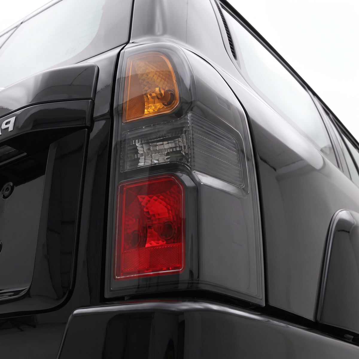 Nissan Patrol GU / Y61 Wagon (2004 - 2016) Dubai Style Black Tail Lights LH + RH installed close-up