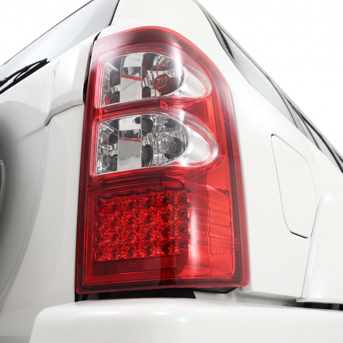 Nissan Patrol GU (1997 - 2004) Clear Red LED Tail Lights LH + RH installed close-up