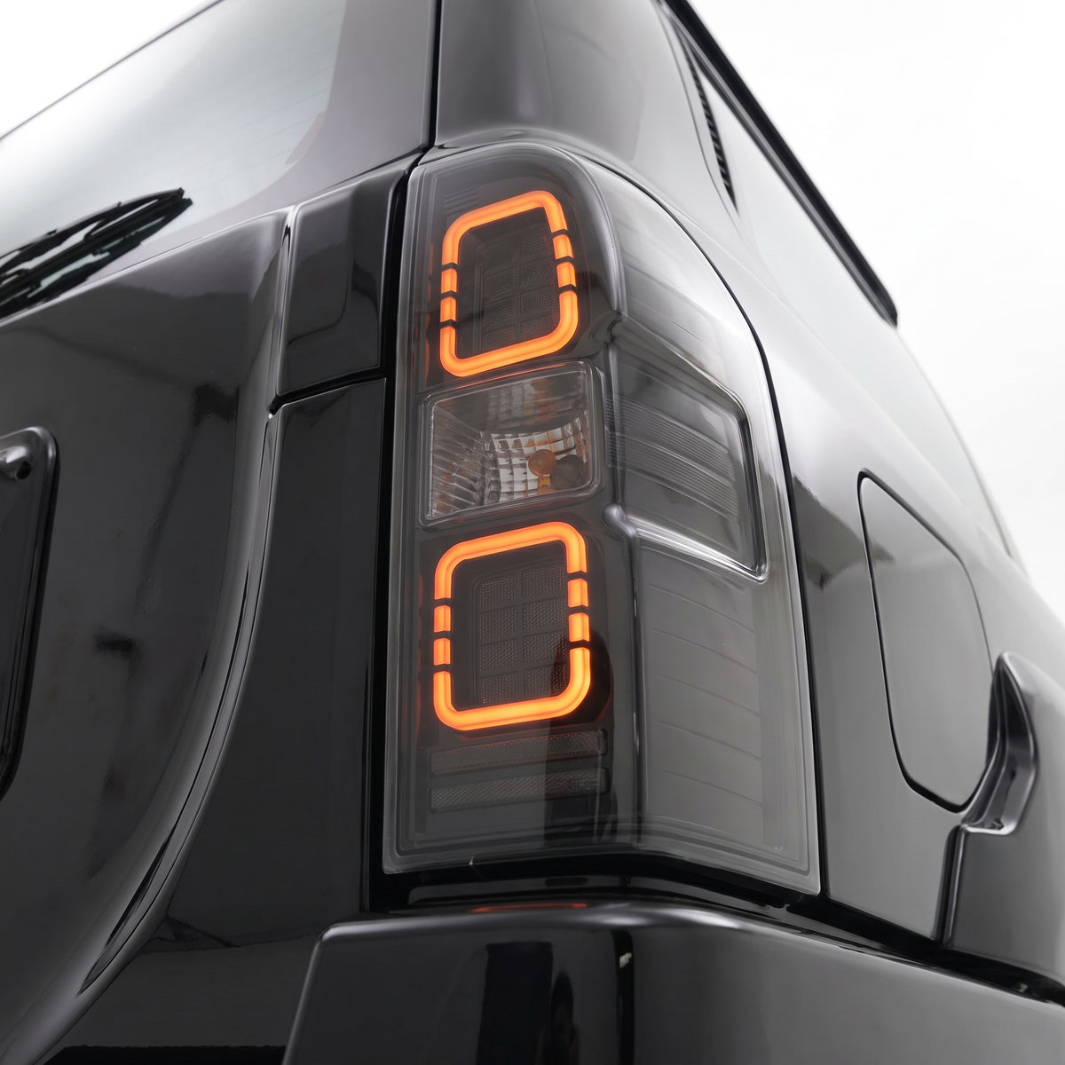 Nissan Patrol GU (2005 - 2016) Full Smoked Sequential LED Tail Lights LH + RH installed close-up