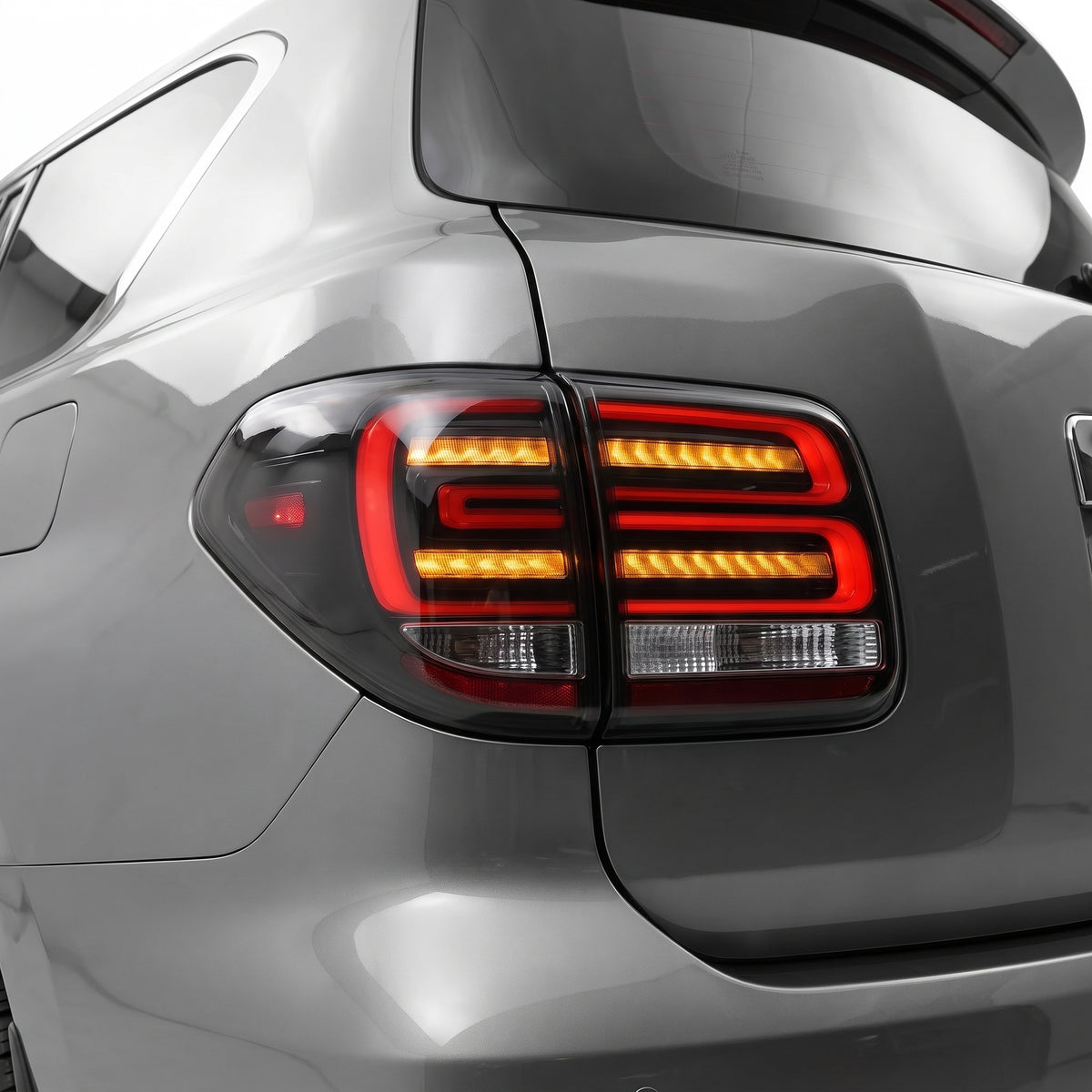 Nissan Patrol Y62 Wagon (2012 - 2019) Sequential Smoked Full LED Tail Lights LH + RH installed close-up