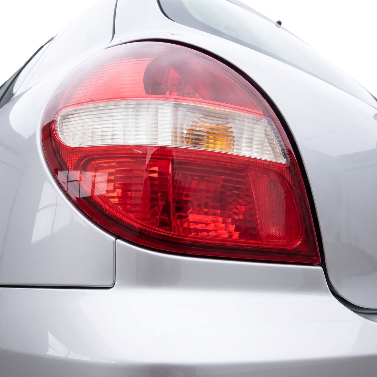 Nissan Pulsar N16 (2000 - 2003) OEM Style Tail Lights LH + RH installed close-up