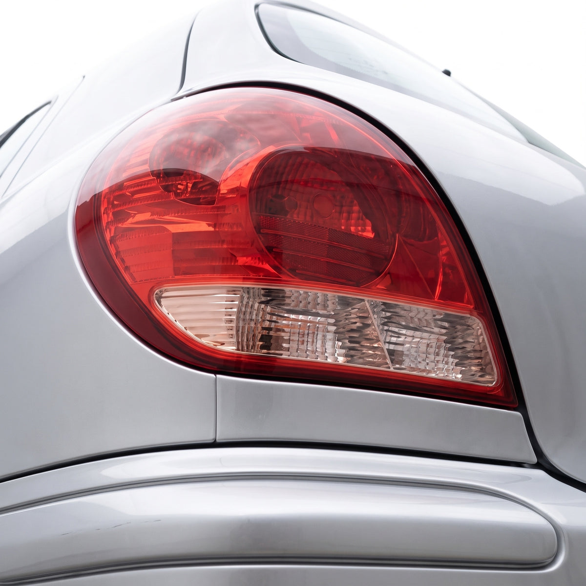Nissan Pulsar N16 (2003 - 2006) OEM Style Tail Lights LH + RH installed close-up