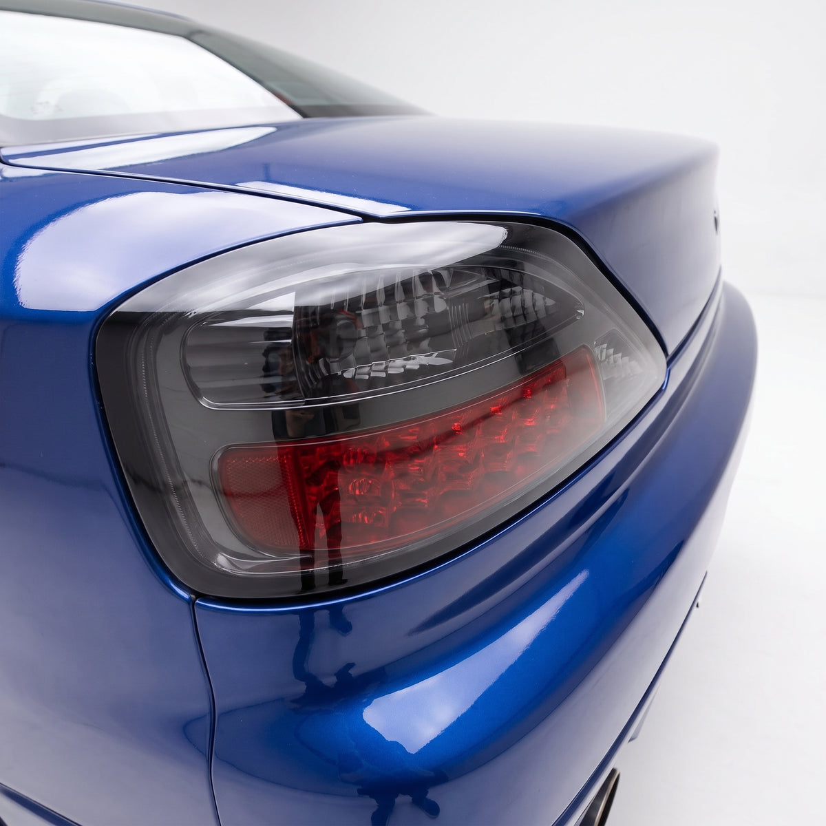 Nissan Silvia S15 (1999 - 2001) YOSHIO Style Smoked LED Tail Lights LH + RH installed close-up