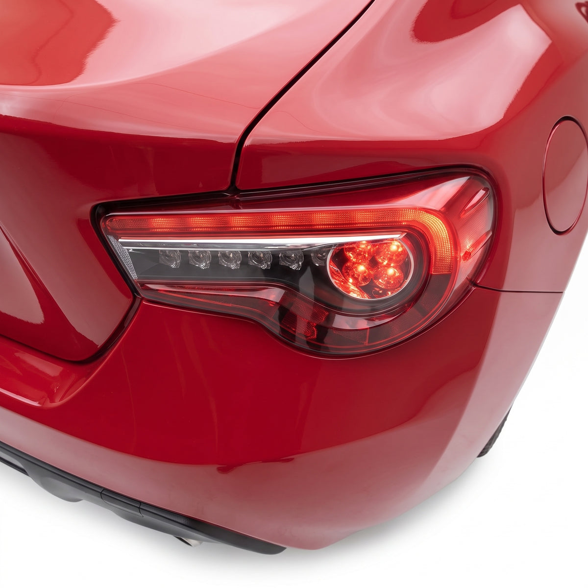 Subaru BRZ / ZC6 1st Gen. (2012 - 2021) Sequential Clear Red Full LED Tail Lights LH + RH installed close-up