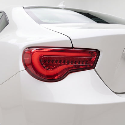 Subaru BRZ / ZC6 1st Gen. (2012 - 2021) Valenti Sequential Clear Red 3D Stripe Bar Full LED Tail Lights LH + RH installed close-up