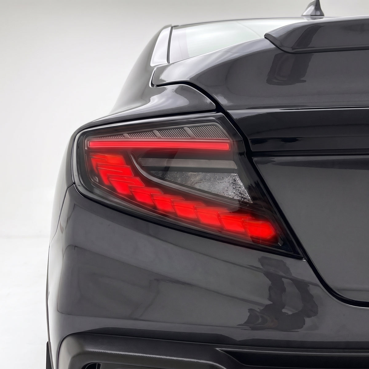 Subaru WRX VB (2022 - 2025) Dragon Scale Style Sequential Smoked Tail Lights LH + RH installed close-up