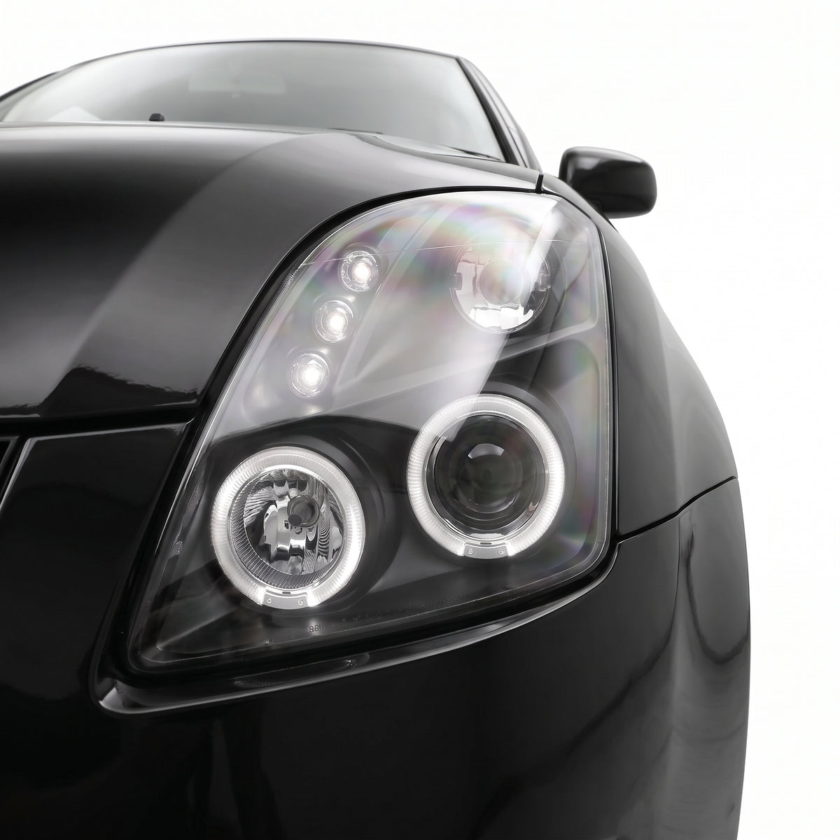 Suzuki Swift EZ (2004 - 2010) Black LED Angel Eyes Projector Headlights LH + RH installed close-up