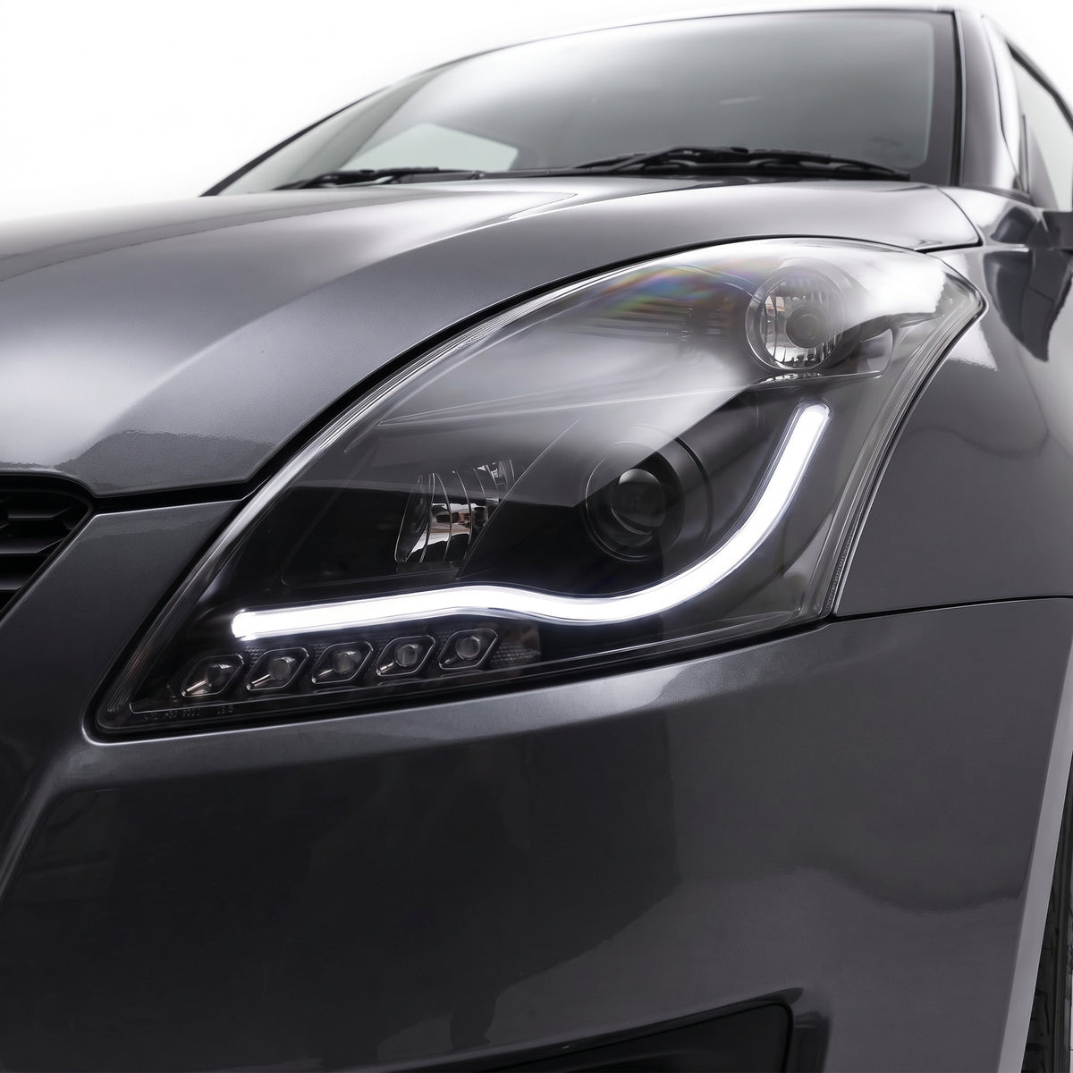 Suzuki Swift FZ (2011 - 2017) Black LED DRL Projector Headlights LH + RH installed close-up