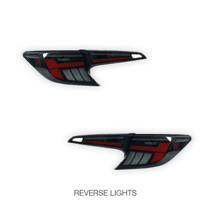 Toyota Corolla E210 Hatch (2019 - 2024) Black Red LED Sequential Tail Lights LH + RH