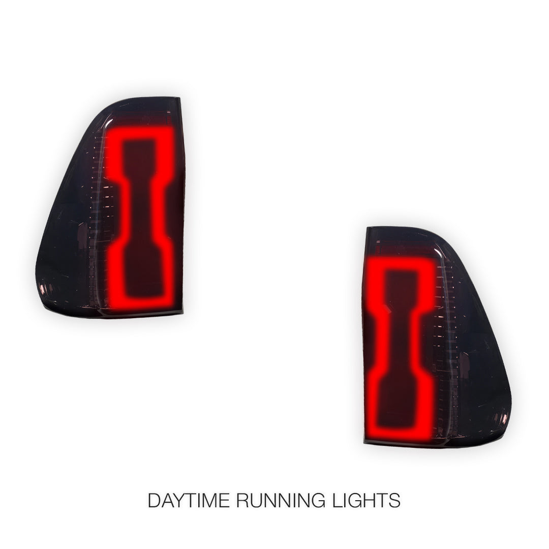 Toyota HiLux N80 (2015 - 2025) Sequential Smoked 3D Stripe Bar Full LED Tail Lights LH + RH