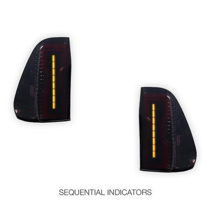 Toyota HiLux N80 (2015 - 2025) Sequential Smoked 3D Stripe Bar Full LED Tail Lights LH + RH