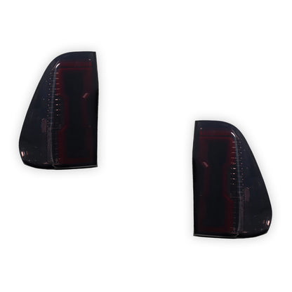 Toyota HiLux N80 (2015 - 2025) Sequential Smoked 3D Stripe Bar Full LED Tail Lights LH + RH