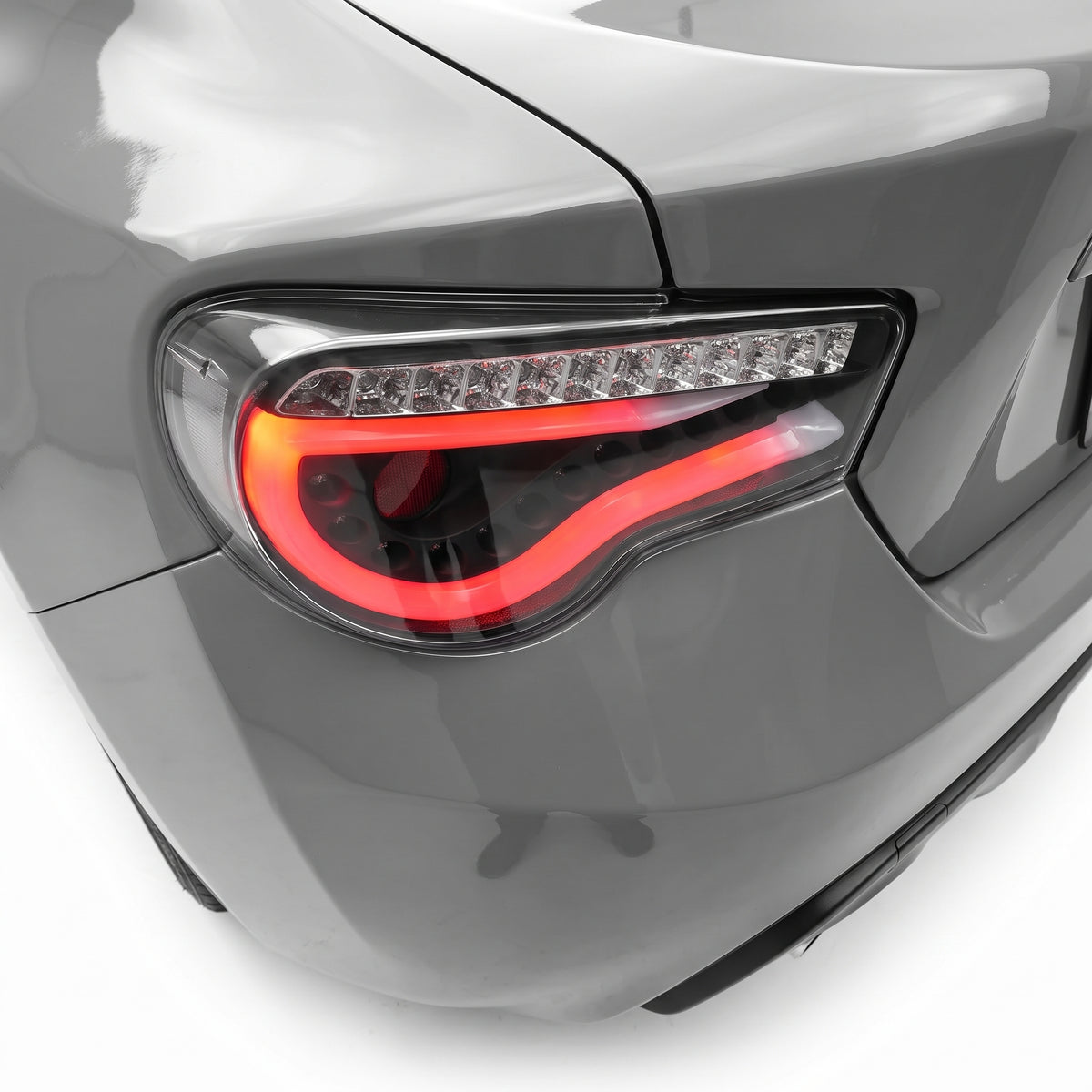 Toyota 86 / ZN6 1st Gen. (2012 - 2021) Sequential Black 3D Stripe Bar Full LED Tail Lights LH + RH installed close-up