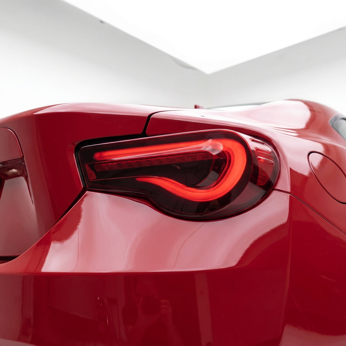 Toyota 86 / ZN6 1st Gen. (2012 - 2021) Valenti Sequential Smoked Red Full LED Tail Lights LH + RH installed close-up