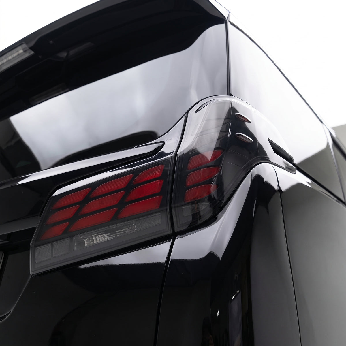 Toyota Alphard AH30 (2019 - 2023) Smoked Sequential LED Tail Lights with Trunk Lights LH + RH installed close-up