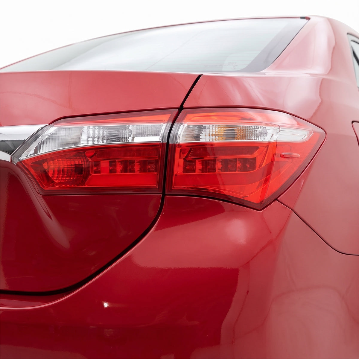 Toyota Corolla E170 / E180 (2012 - 2017) Smoked LED Sequential Tail Lights LH + RH installed close-up