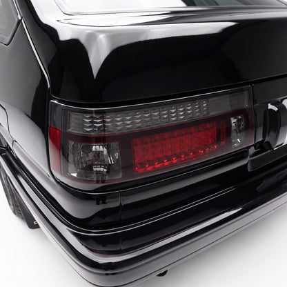 Toyota Corolla E80 / AE86 (1983 - 1987) Smoked Red LED Tail Lights LH + RH installed close-up