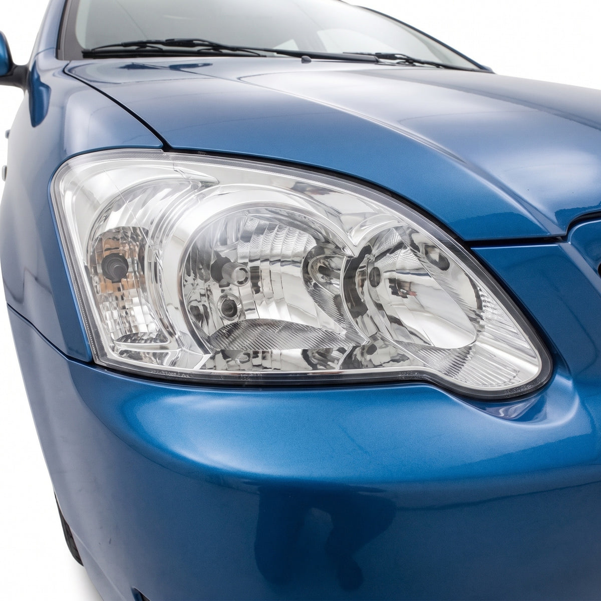 Toyota Corolla ZZE122 Hatch (2001 - 2007) OEM Style Headlights LH + RH installed close-up