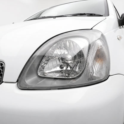 Toyota Echo NCP (1999 - 2002) OEM Style Headlights LH + RH installed close-up