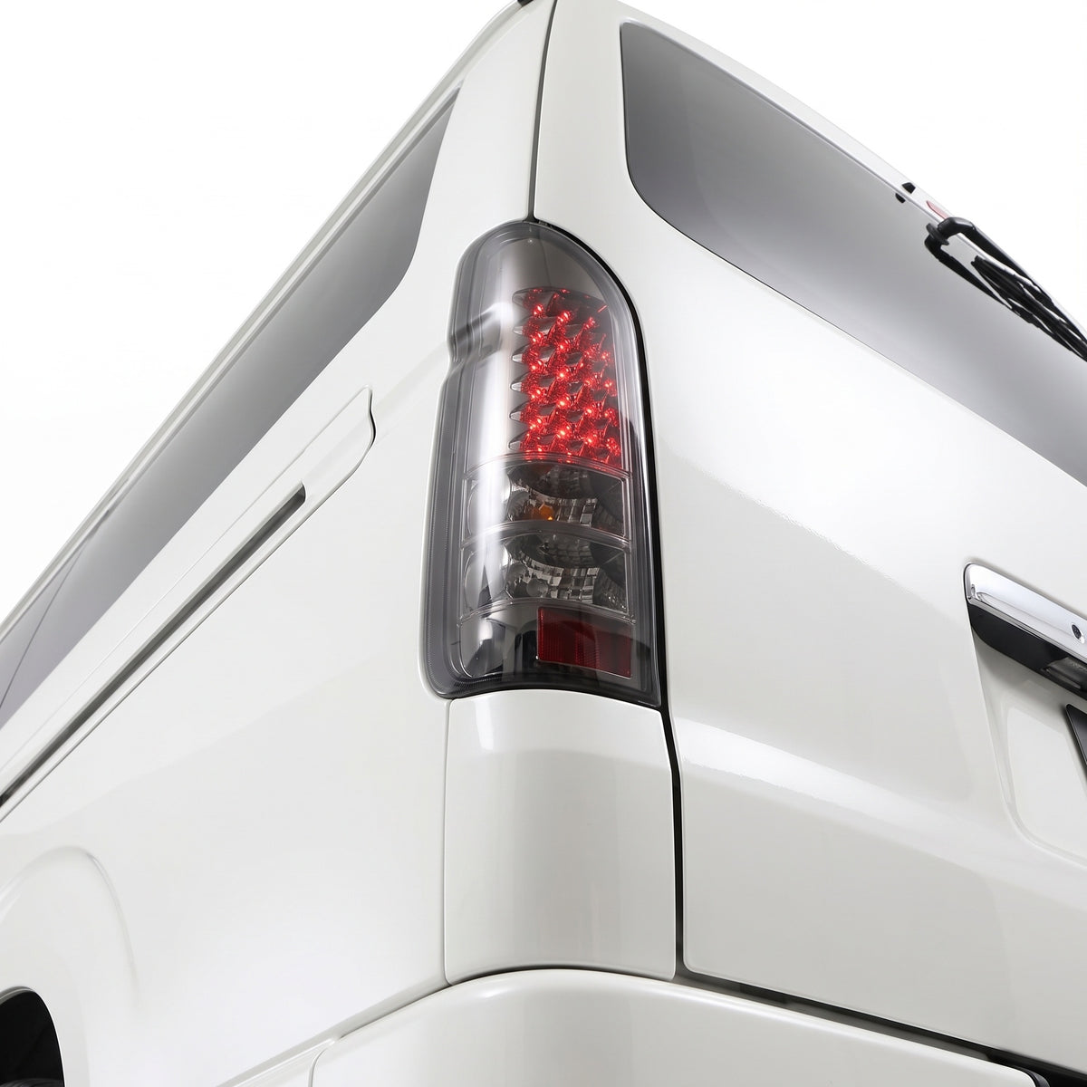 Toyota HiAce H200 (2005 - 2018) Smoked Black LED Tail Lights LH + RH installed close-up
