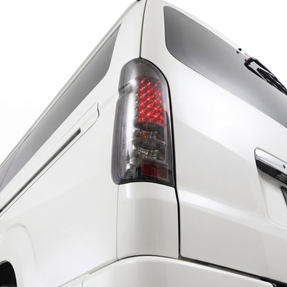 Toyota HiAce H200 (2005 - 2018) Smoked Black LED Tail Lights LH + RH installed close-up