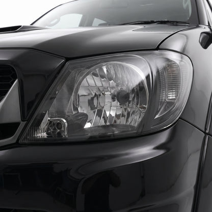 Toyota HiLux GGN / KUN / TGN Ute (2005 - 2012) Smoked Corner Lights Clear Headlights LH + RH installed close-up