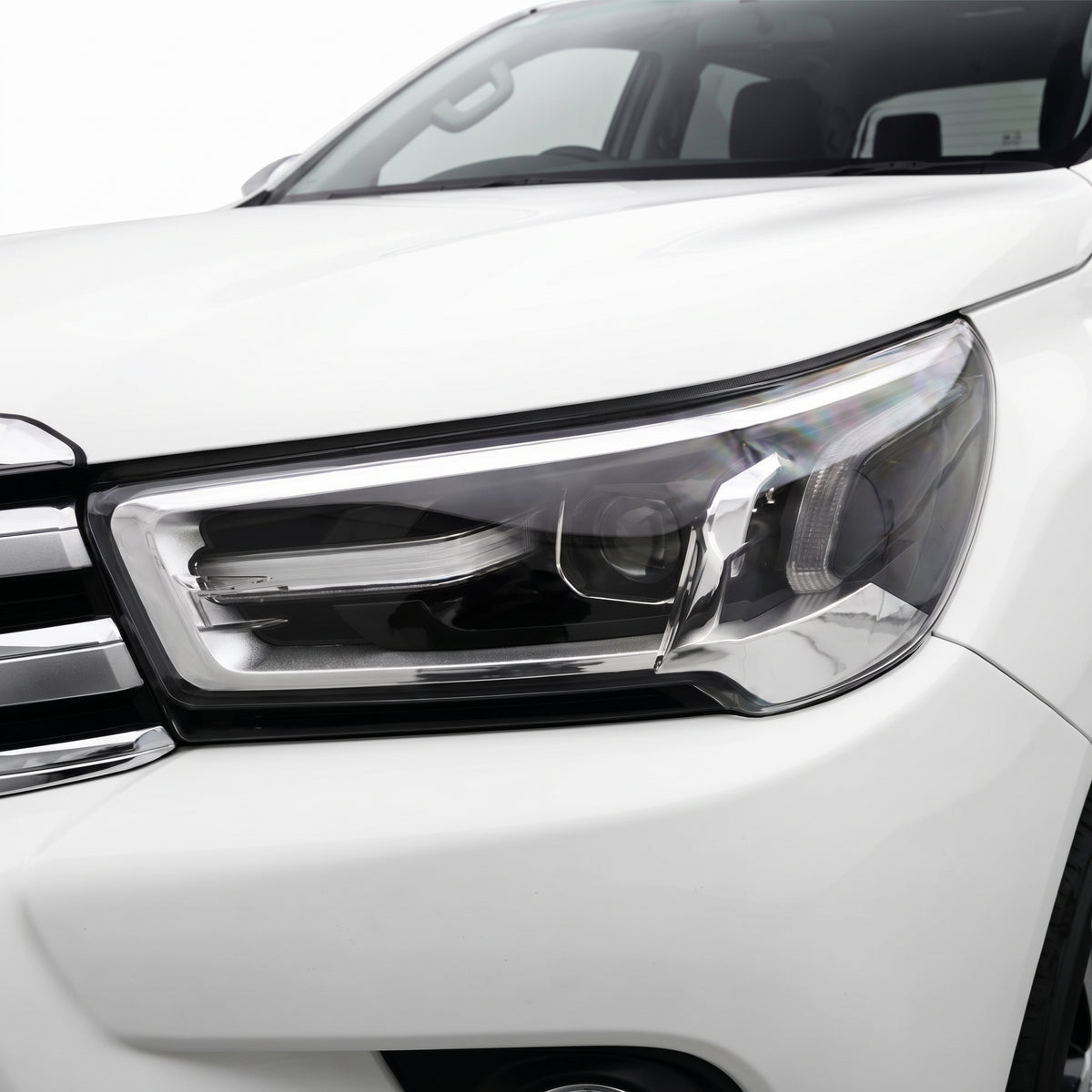 Toyota HiLux N80 GUN126 / GUN136 (2020 - 2025) OEM Style Headlights LH + RH installed close-up