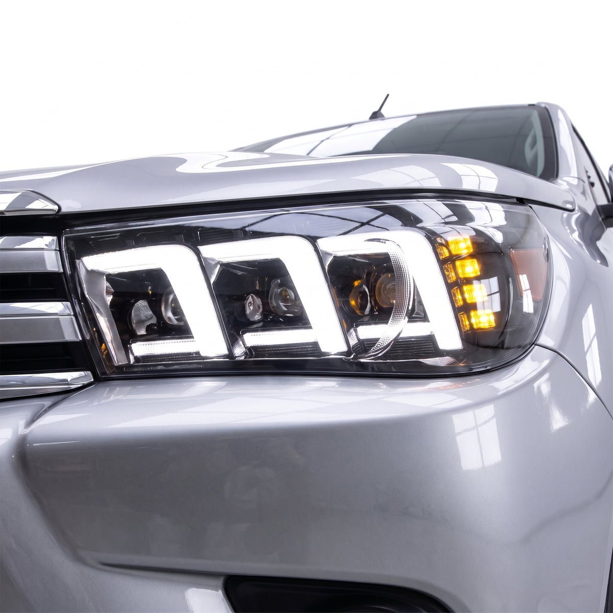 Toyota HiLux N80 (2016 - 2020) Sequential Headlights LH + RH installed close-up