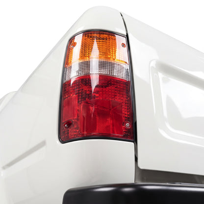Toyota Hilux N50 (1988 - 1997) OEM Style Tail Lights LH + RH installed close-up