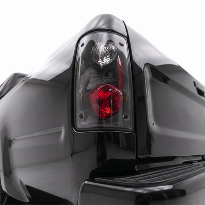 Toyota Hilux N50 (1989 - 1997) JDM Style Black Altezza Tail Lights LH + RH installed close-up