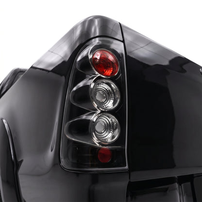 Toyota Hilux N70 / Vigo (2005 - 2014) Black Altezza Tail Lights LH + RH installed close-up