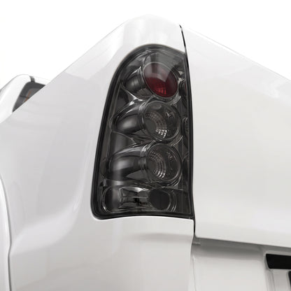 Toyota Hilux N70 / Vigo (2005 - 2014) Full Smoked Altezza Tail Lights LH + RH installed close-up
