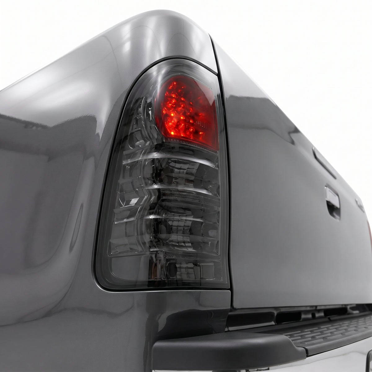 Toyota Hilux N70 / Vigo (2005 - 2014) Smoked Black LED Tail Lights LH + RH installed close-up