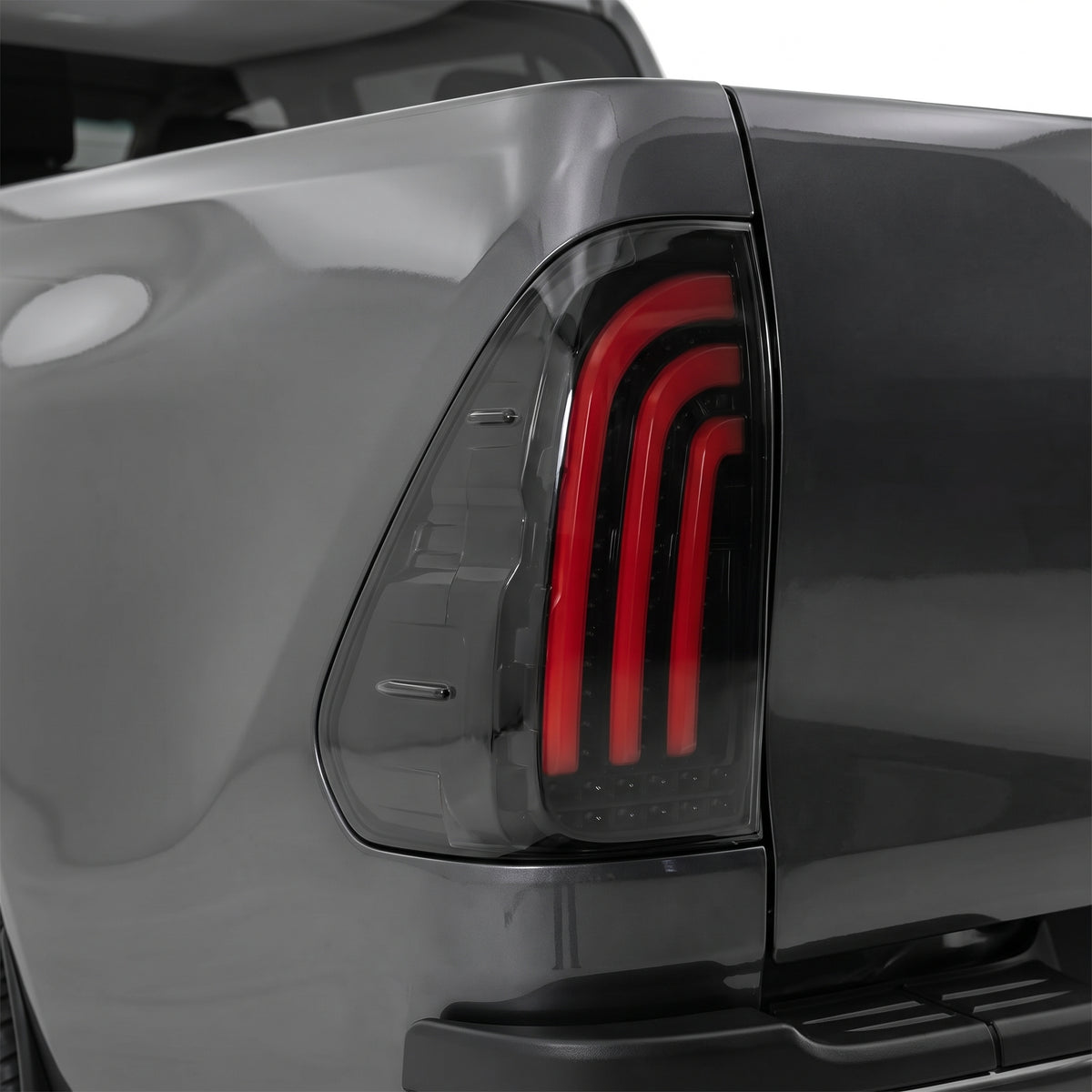 Toyota Hilux N80 / Revo Rocco (2015 - 2024) Sequential Smoked 3D Stripe Bar Full LED Tail Lights LH + RH installed